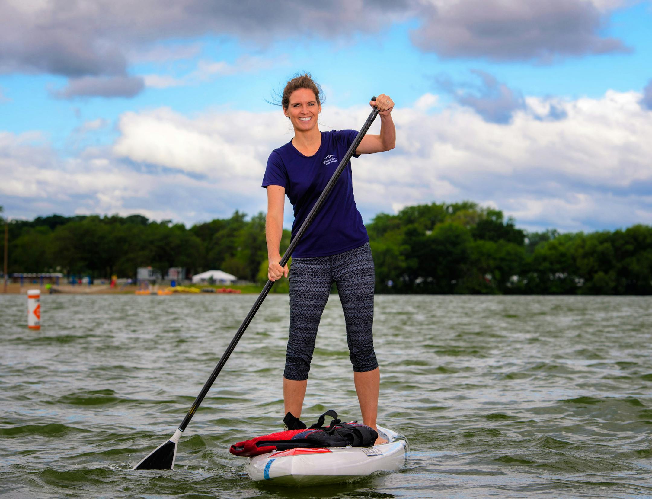 Megan Kelzenberg, a standup paddling instructor for Three Rivers Park District. ] GLEN STUBBE * gstubbe@startribune.com Friday, July 8, 2016 We are shooting a portraits of some Summer Insiders, including Megan Kelzenberg, a standup paddling instructor for Three Rivers Park District. Hoping for something of her in the water, but am open to ideas. Might try to bring a second paddleboard.The others are camping expert Eric Pelto and hiking mom Maura Marko.