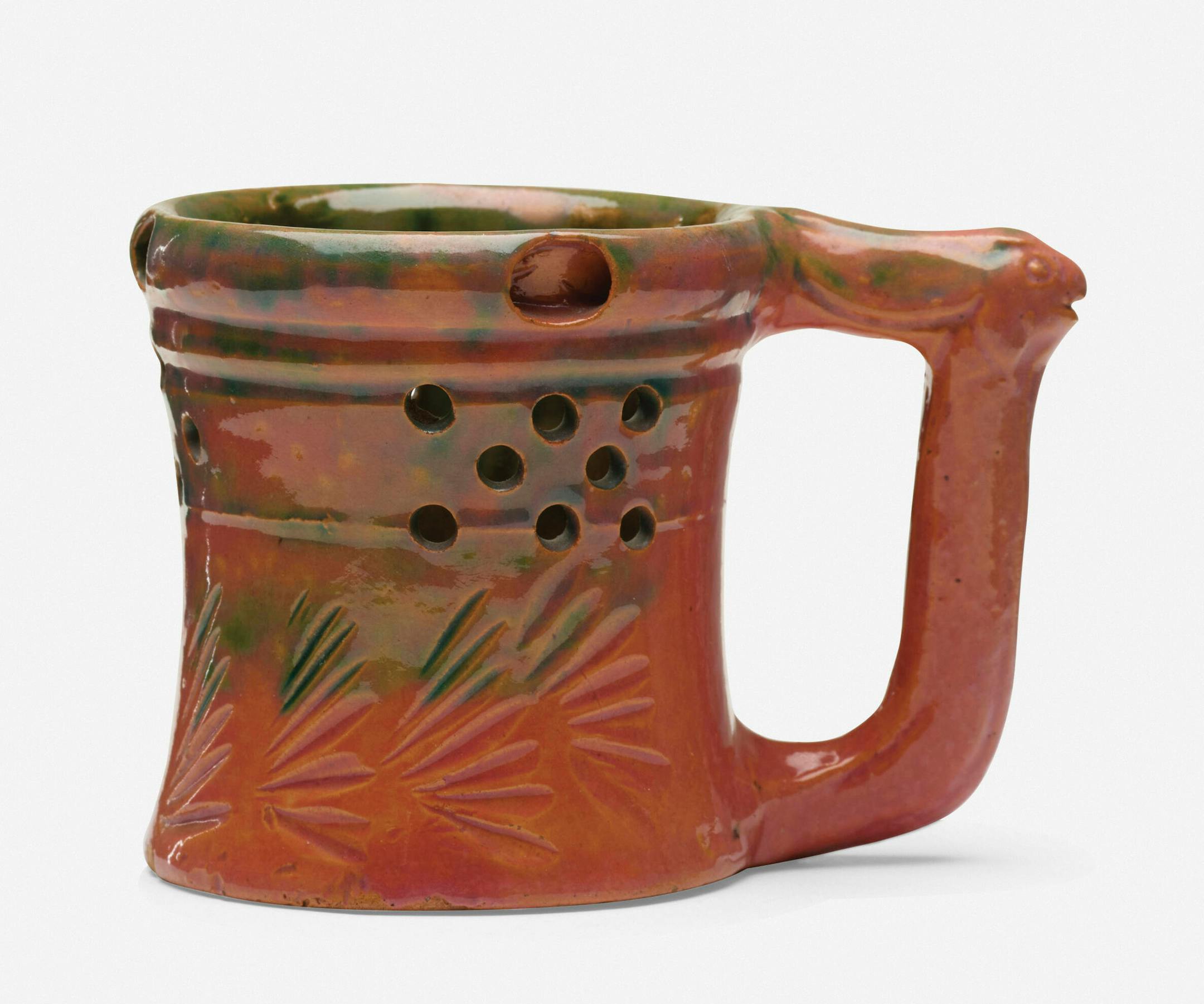 George E. Ohr's pottery can be recognized by its thin clay, vividly colored glaze and an overall sense of eccentricity. Cowles Syndicate