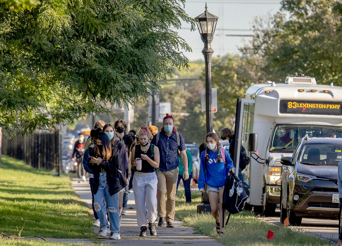 St. Paul Central High School students made their way to campus by foot, car, or city bus, but not by a yellow school bus, Thursday, September 9, 2021 in St. Paul, MN. ] ELIZABETH FLORES • liz.flores@startribune.com