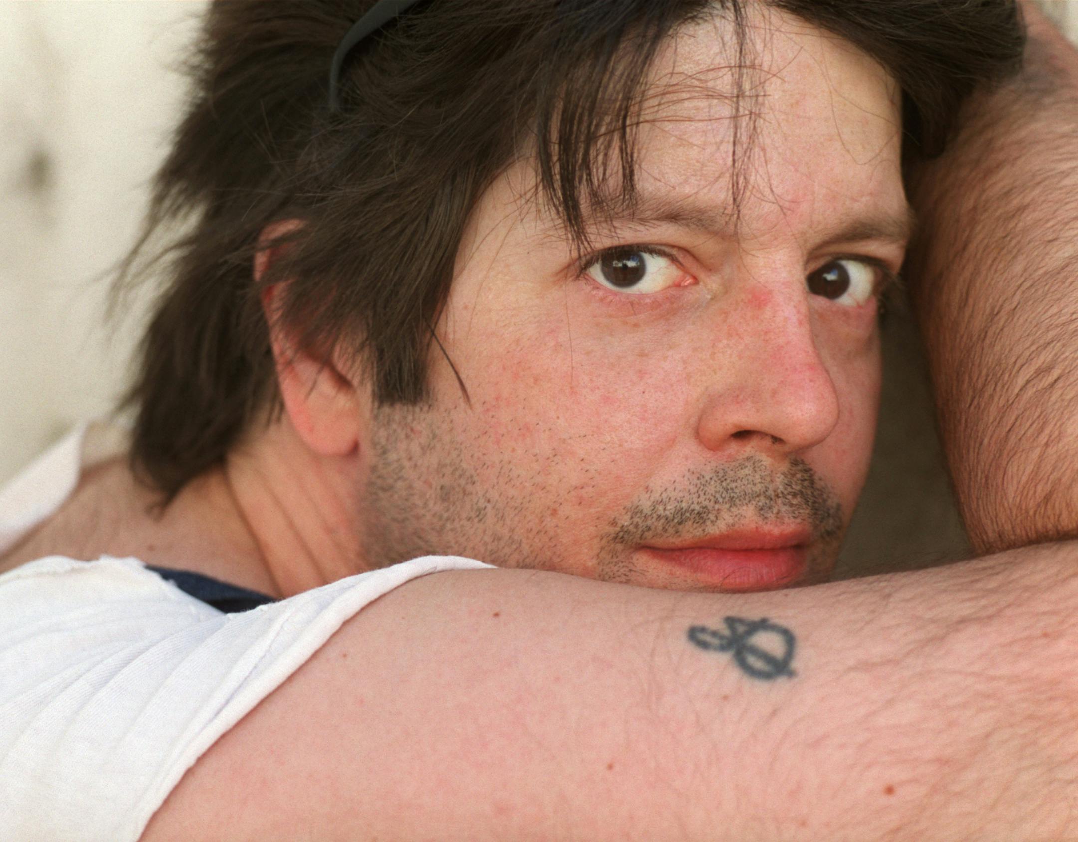 In this May 2000 photo, former Husker Du drummer Grant Hart poses for a photo in Minneapolis. Ken Shipley, who runs the band&#x2019;s record label Numero Group, told The Associated Press that Hart died at the age of 56 on Wednesday, Sept. 13, 2017, of cancer at his home in St. Paul, Minn. (Jeff Wheeler/Star Tribune via AP)