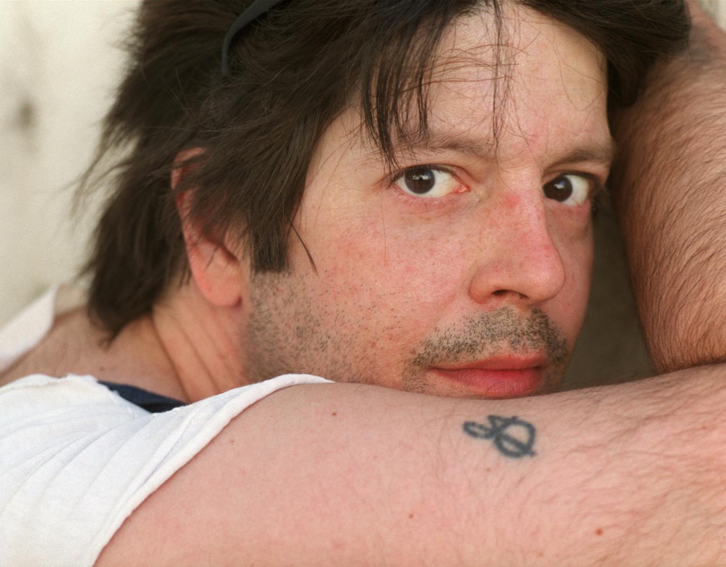 In this May 2000 photo, former Husker Du drummer Grant Hart poses for a photo in Minneapolis. Ken Shipley, who runs the band&#x2019;s record label Numero Group, told The Associated Press that Hart died at the age of 56 on Wednesday, Sept. 13, 2017, of cancer at his home in St. Paul, Minn. (Jeff Wheeler/Star Tribune via AP)