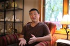 Le Wang, 31, a business ananalyst, is concerned that a new immigration regulation would make it impossible for his family to emigrate from China to th