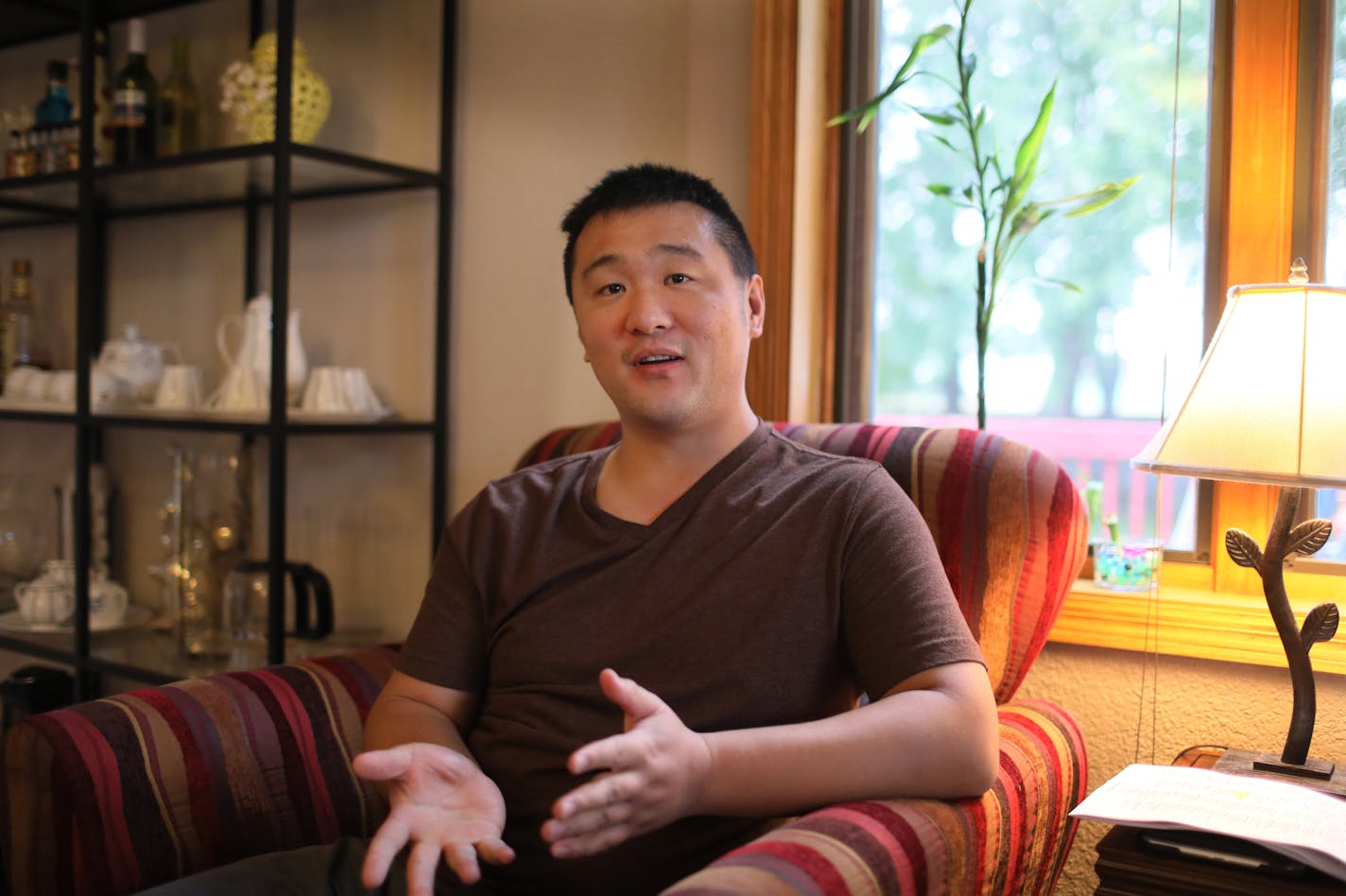 Le Wang, 31, a business ananalyst, is concerned that a new immigration regulation would make it impossible for his family to emigrate from China to the U.S., where they can spend time with his newborn daughter. Here, Wang, talked about his concern about new immigration regulation from his home Thursday, Sept. 27, 2018, in Cottage Grove, MN.] DAVID JOLES &#xef; david.joles@startribune.com A wave of anxiety has spread among immigrant families in Minnesota since the Trump administration last week r