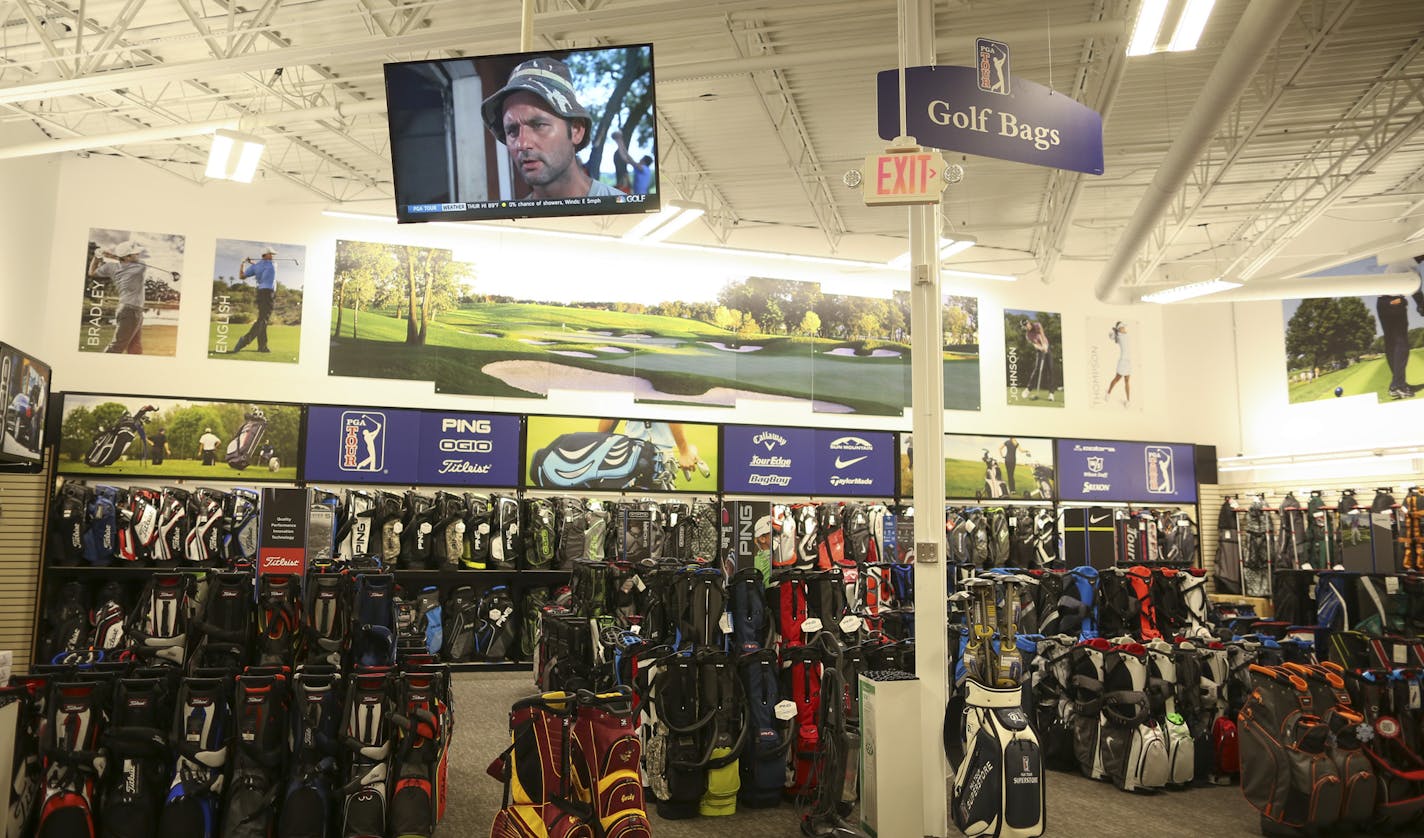 The golf bag department at the PGA Tour Superstore. ] JEFF WHEELER &#xef; jeff.wheeler@startribune.com A PGA Tour Superstore will open in Minnetonka Saturday. On Wednesday afternoon, June 8, 2016 inventory was being labeled and arranged ahead of the grand opening.