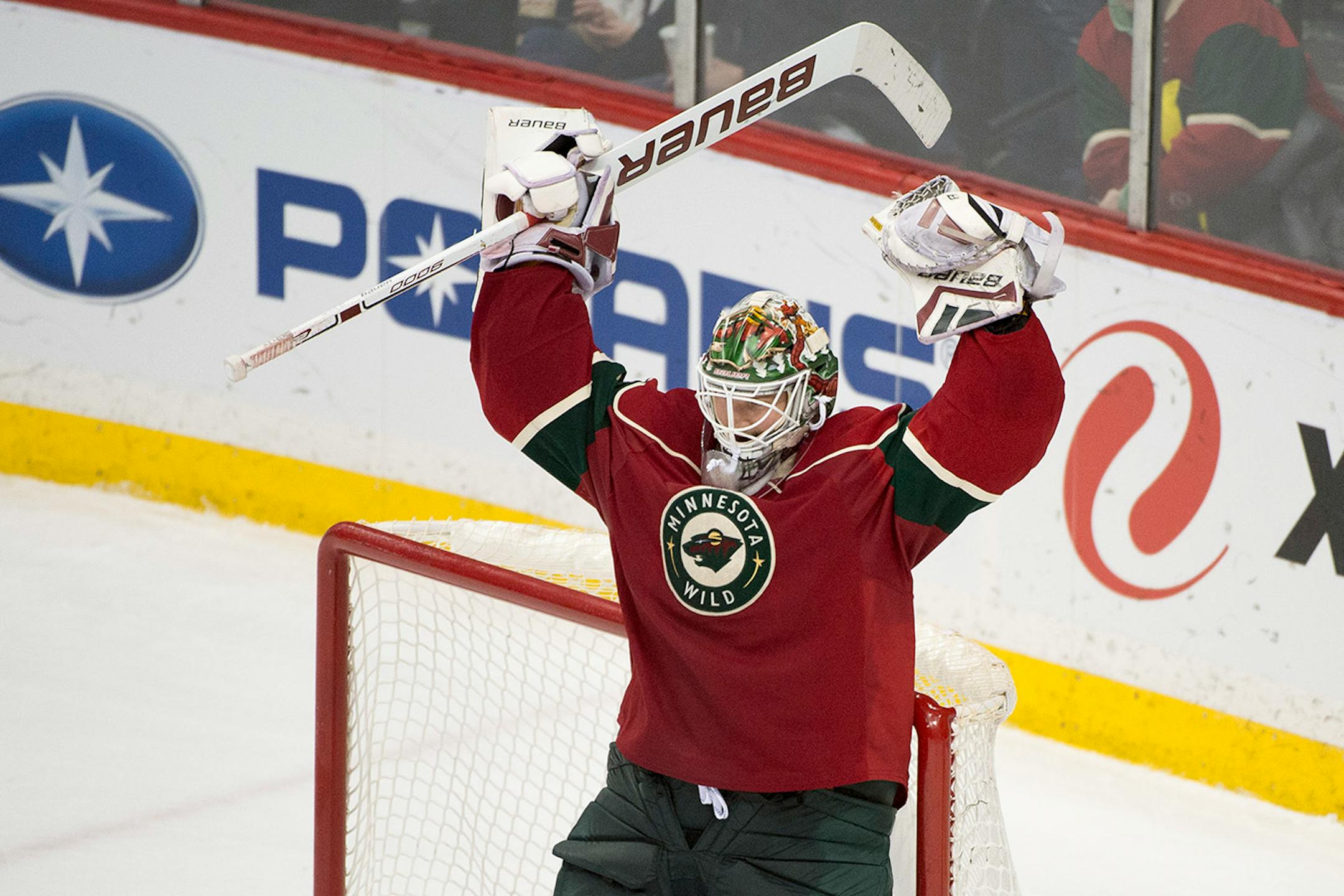 Minnesota Wild goalie Devan Dubnyk (40) celebrates after defeating the Florida Panthers 2-1 on Thursday night. ] (Aaron Lavinsky | StarTribune) The Minnesota Wild take on the Florida Panthers Thursday, Feb. 12, 2015 at Xcel Energy Center in St. Paul.