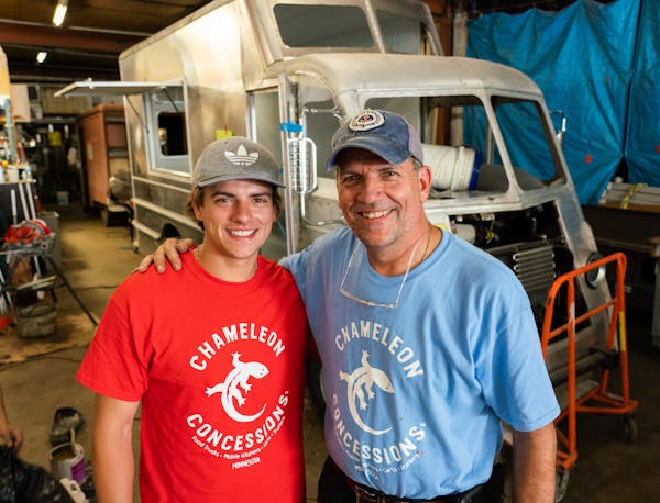 Luke Palm and his father Mark. ] MARK VANCLEAVE &#x2022; Mark Palm, owner of Chameleon Concessions, has crafted just about every food truck operating 