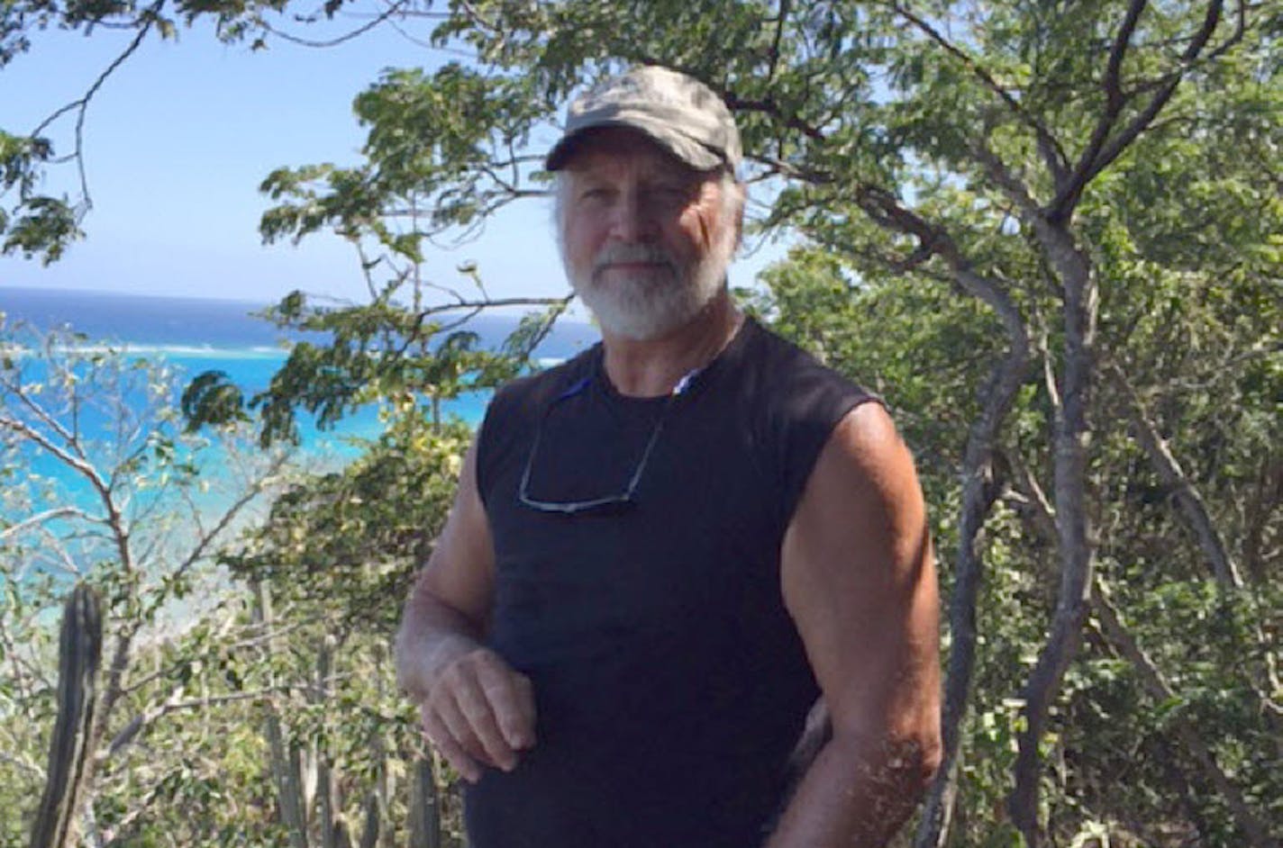 This March 6, 2015, photo provided by Donna Thompson, shows her husband David Thompson at Virgen Gorda, British Virgin Islands.