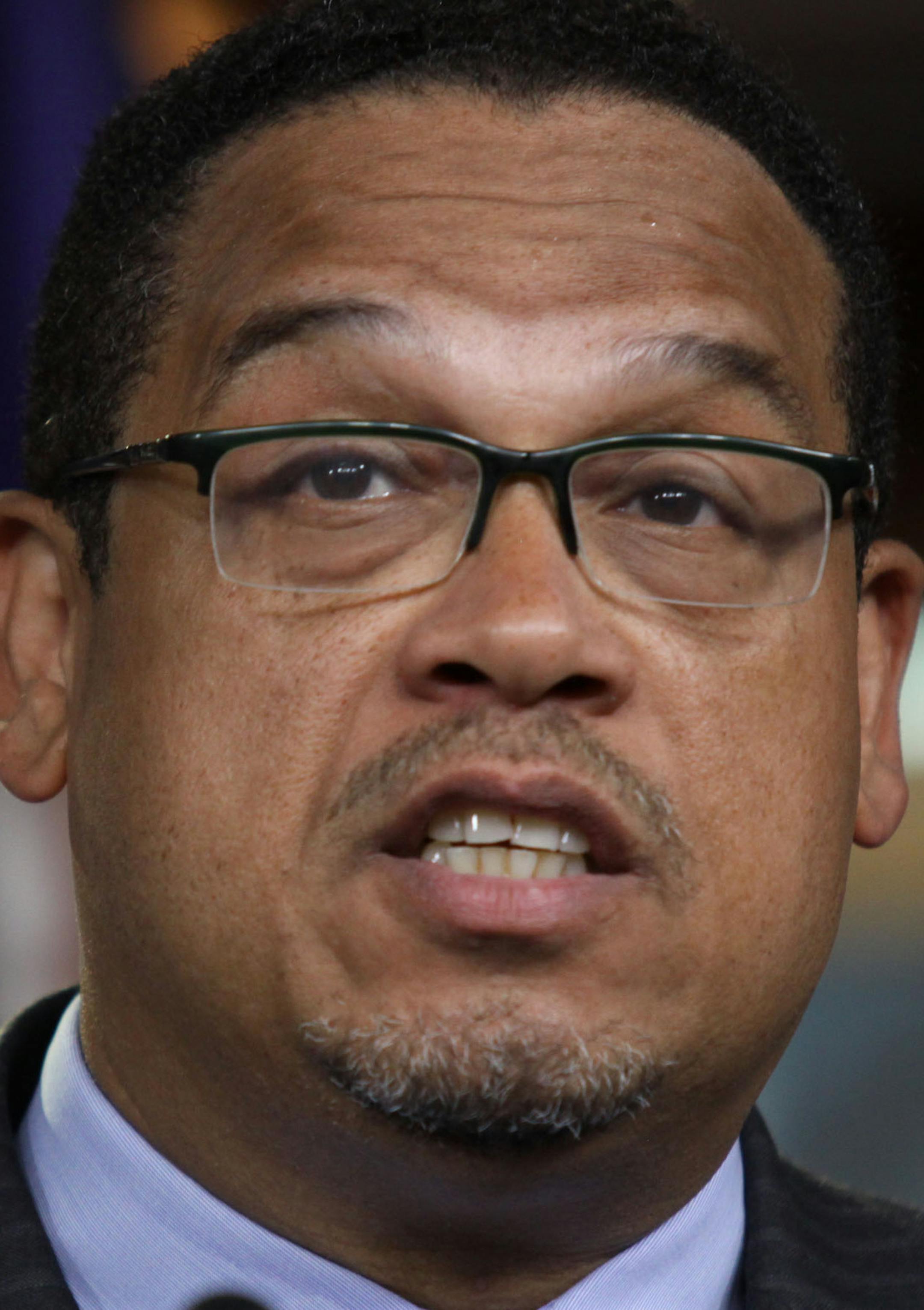 Rep. Keith Ellison, D-Minn., accompanied by fellow House Democrats, gestures during a news conference on Capitol Hill in Washington, Tuesday, June 16, 2016, to discuss opposition to the President Barack Obama's trade deal. Despite Obama's direct appeal, House Democrats voted overwhelmingly on Friday to reject a jobs retraining program because it was legislatively linked to fast track, which they want to kill. Both parties were asking Tuesday whether they could persuade enough colleagues to switc