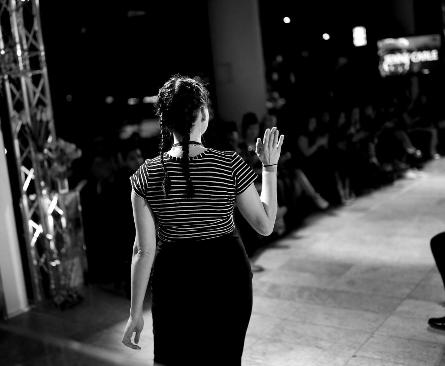 Designer Jenny Carle waived to the crowd after showing her collection on the runway at the Envision Spring 2016 fashion show at Orchestra Hall. ] CARLOS GONZALEZ cgonzalez@startribune.com - April 9, 2016, Minneapolis, MN, Orchestra Hall, Minnesota Fashion Week, ENVISION SPRING 2016