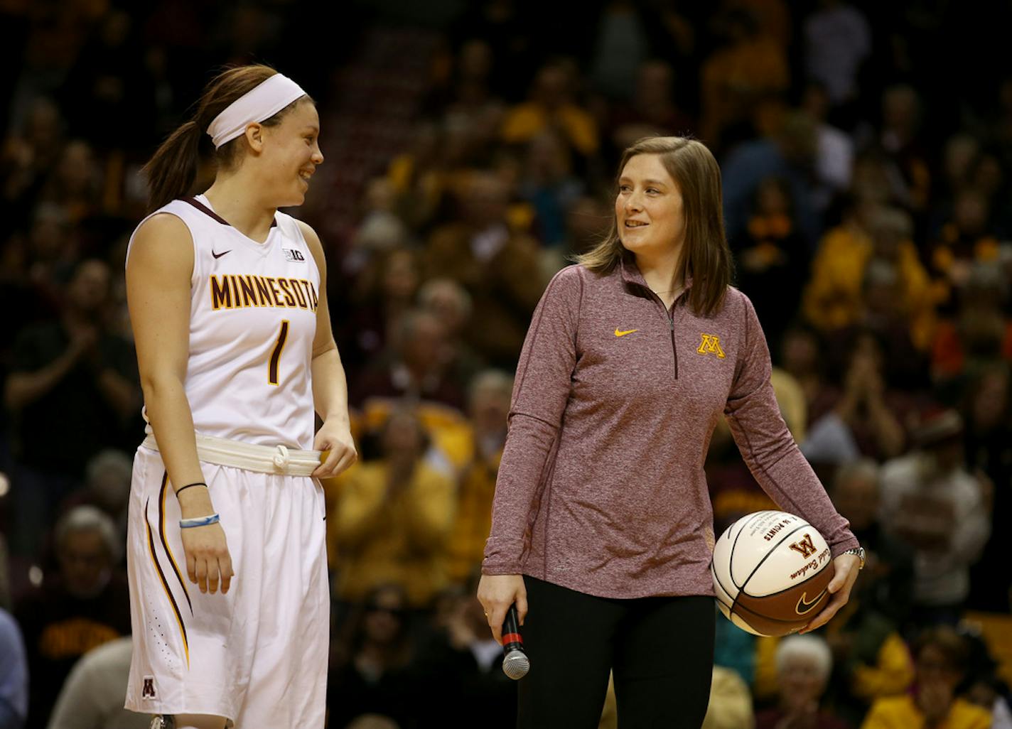 Lynx Lindsay Whalen chatted with Gopher Rachel Banham after a highlight video played to honor Banham as the all time leading   scorer before the Gophers game against Memphis.   ] (KYNDELL HARKNESS/STAR TRIBUNE) kyndell.harkness@startribune.com  Gophers vs Memphis at Williams Arena  in Minneapolis Min., Saturday December 12   2015.