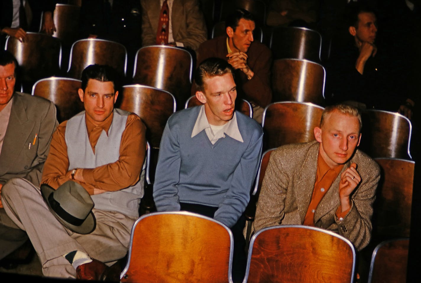 Whitey Skoog, at front right, was photographed when the Minneapolis Lakers played an exhibition game in Montevideo, Minn., in 1954. Next to him is Lew Hitch. Behind them are Lakers stars Jim Pollard (left) and Vern Mikkelsen.