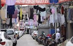 Shanghai laundry (Eric Roper) - "Laundry hanging out to dry in the Old City portion of Shanghai." ORG XMIT: GalNVe--WpOGPWut6f9s
