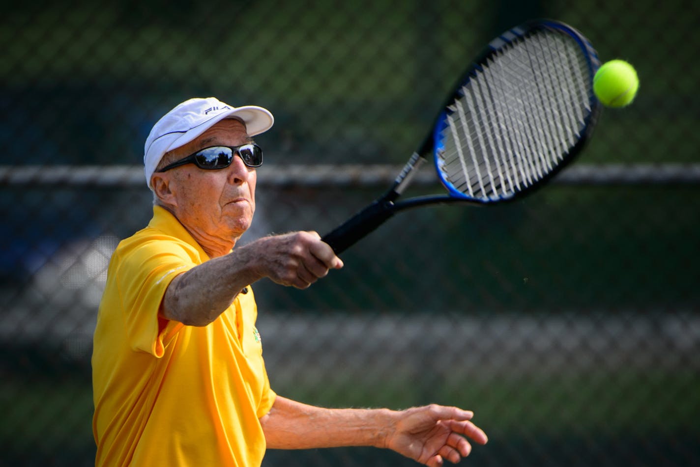 93-year-old Ray Ranallo played tennis at the courts at 85th and Bryant in Bloomington. He will be competing in the Senior Games. ] GLEN STUBBE * gstubbe@startribune.com Friday, June 19, 2015 ORG XMIT: MIN1506191536471923