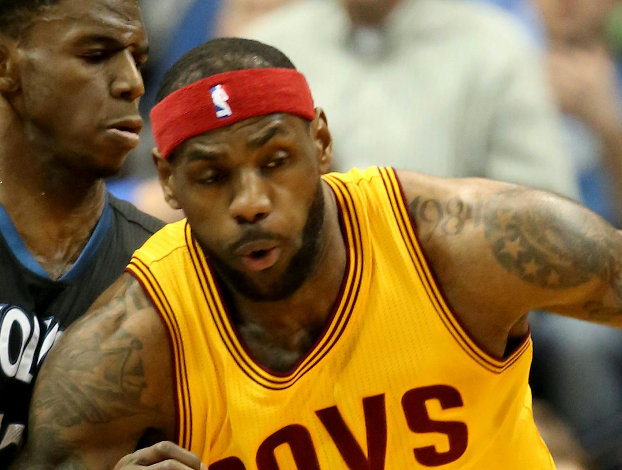 Cavaliers LeBron James made a move toward the basket with Wolves Andrew Wiggins defending in the first half. ] (KYNDELL HARKNESS/STAR TRIBUNE) kyndell.harkness@startribune.com Timberwolves vs Cleveland at the Target Center in Minneapolis Min., Saturday, January 31, 2015.