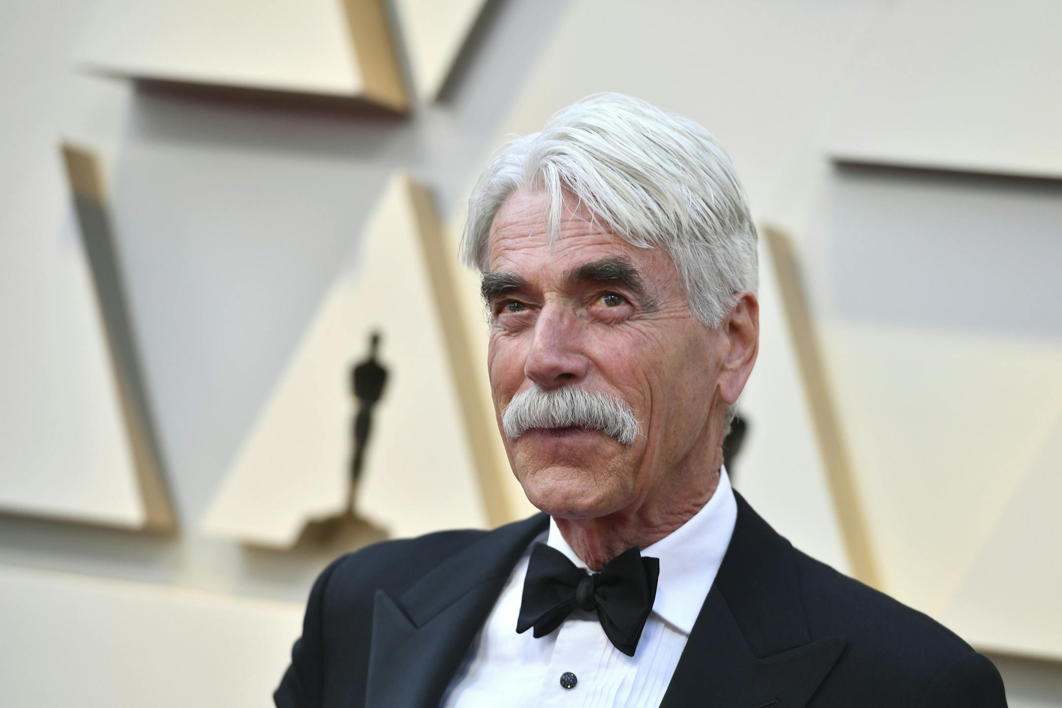 Sam Elliott arrives at the Oscars on Sunday, Feb. 24, 2019, at the Dolby Theatre in Los Angeles.