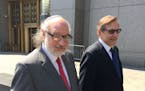 Convicted spy Jonathan Pollard, left, with his lawyer, Eliot Lauer, left federal court in New York following a hearing July 22, 2016.