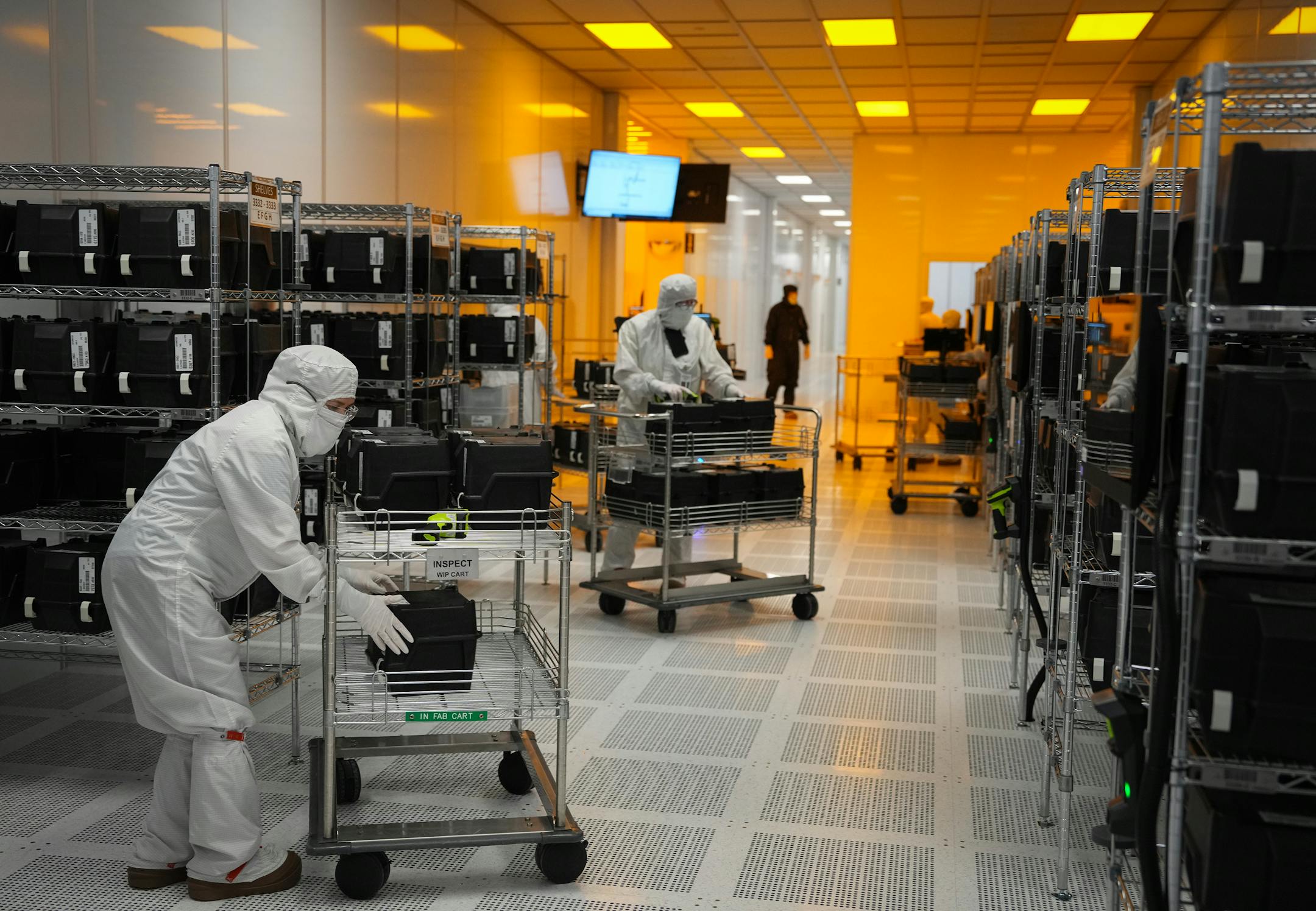Polar Semiconductor employees work in one of three fabrication areas inside the company's expansive clean room.