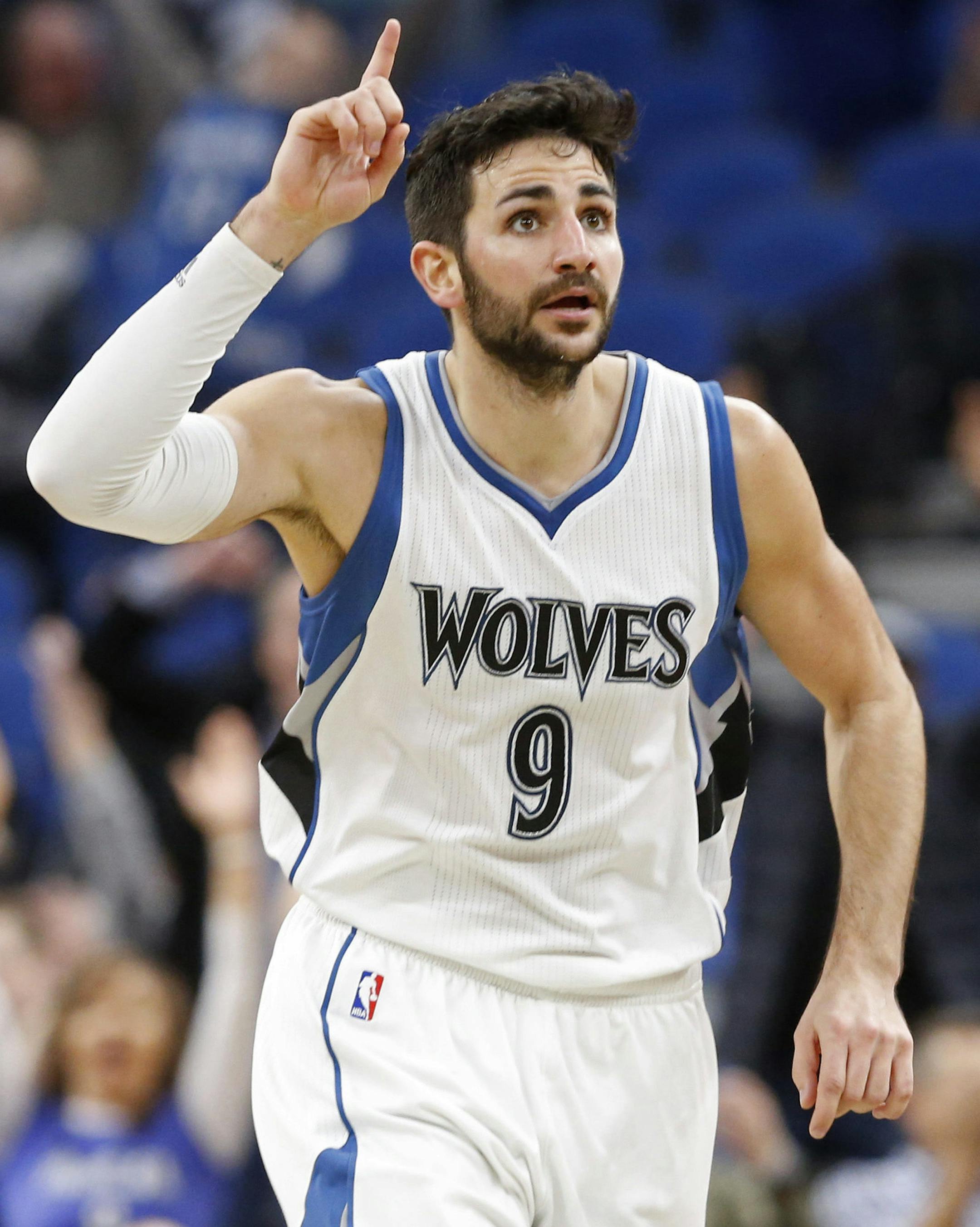 Minnesota Timberwolves' Ricky Rubio, of Spain, celebrates one of his three-point shots during the second half of an NBA basketball game against the Orlando Magic, Monday, Jan. 30, 2017, in Minneapolis. The Timberwolves won 111-105 in overtime. Rubio had six three-pointers and scored 22 points. (AP Photo/Jim Mone)