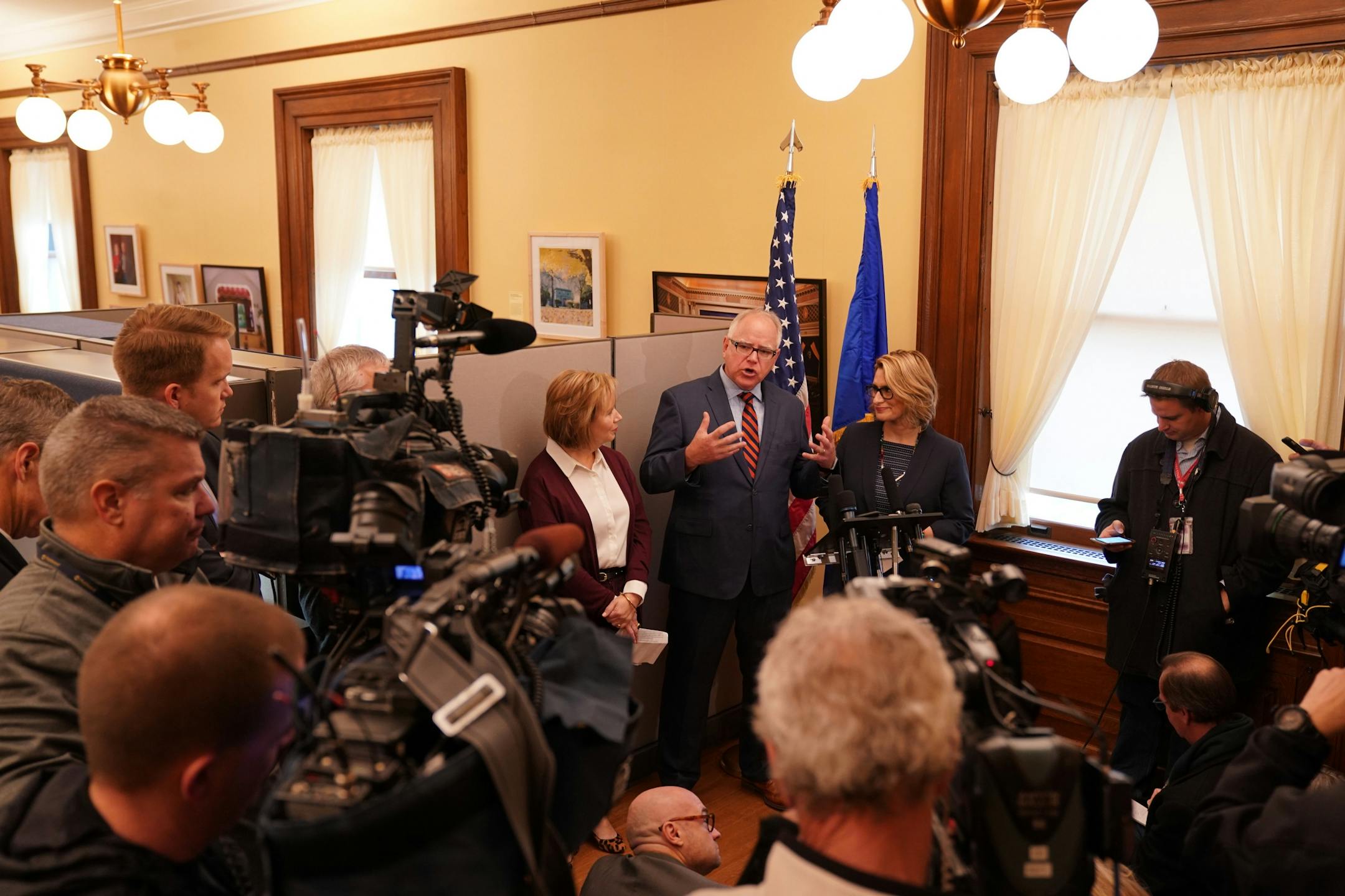 Gwen Walz, her husband Gov.-elect Tim Walz, and Lt. Gov.-elect Peggy Flanagan talked with reporters during a press conference at their transition offices in the State Capitol Thursday morning.