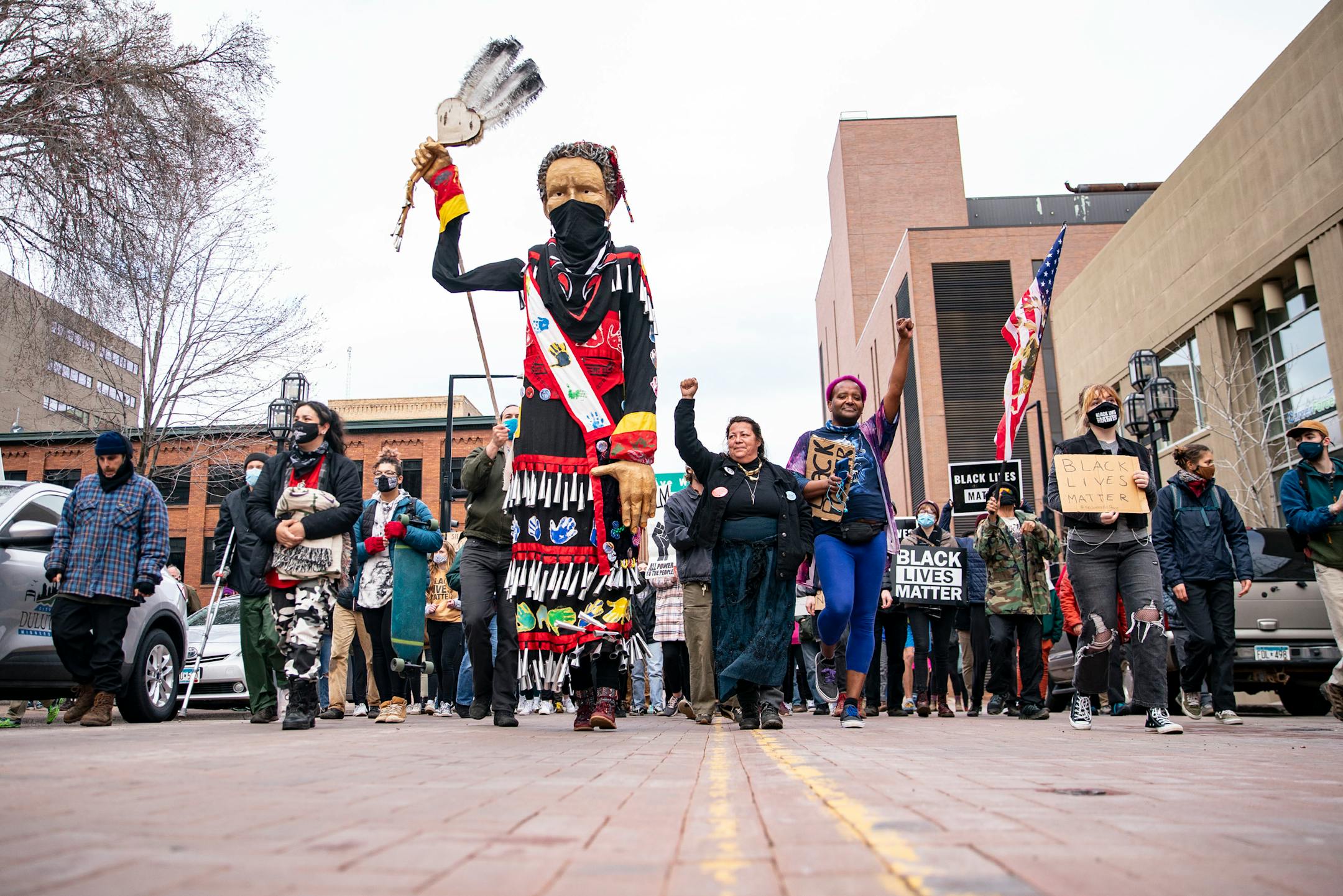 Miindiimooaye, a puppet made by indigenous activists, led protestors during their march on Wednesday. She was created after Jason Pero was shot and killed by an Ashland County Sheriff in 2017 and is meant to bring healing to communities.