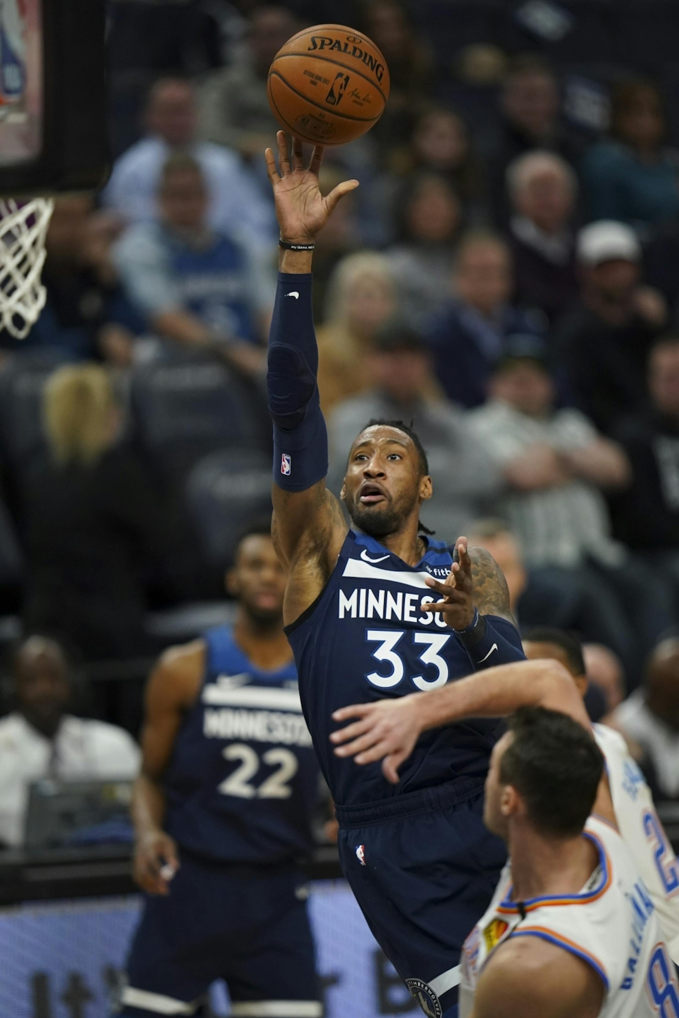 Minnesota Timberwolves forward Robert Covington (33) with a third quarter shot. He was second high scorer for Minnesota with 18 points.