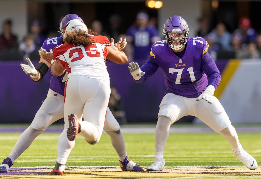 The Vikings’ Christian Darrisaw (71) is one of three NFL tackles who have started every game and not allowed a sack this season. 