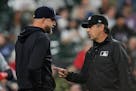Twins manager Rocco Baldelli, left, seen during an April 29 game vs. the White Sox, voiced his support for an automated strike zone after a previous n