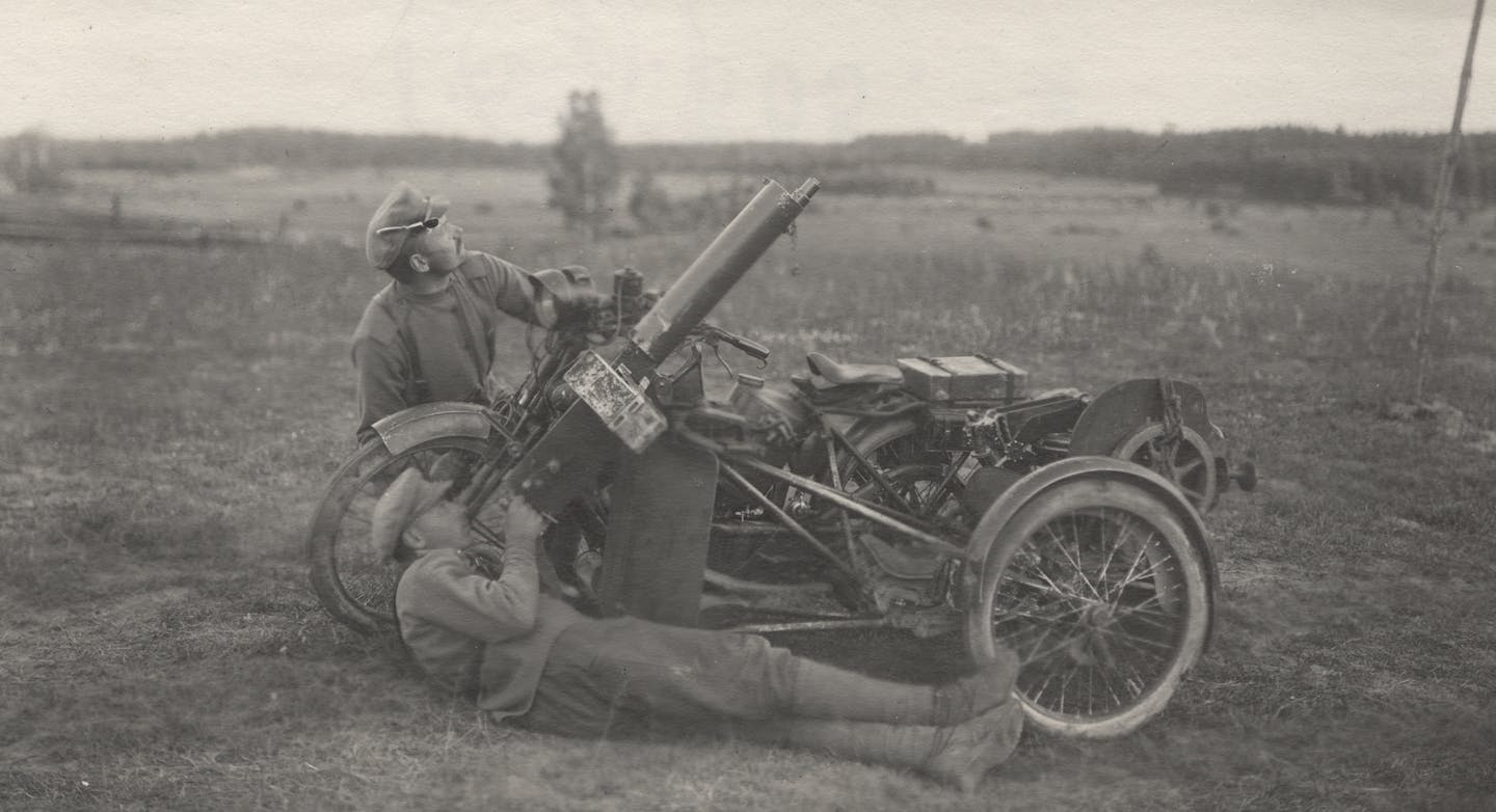 Russian soldiers took aim at an airplane in this 1916 photograph by V.S. Ivanov that&#x2019;s included in the &#x201c;Faces of War&#x201d; exhibit at the Museum of Russian Art.