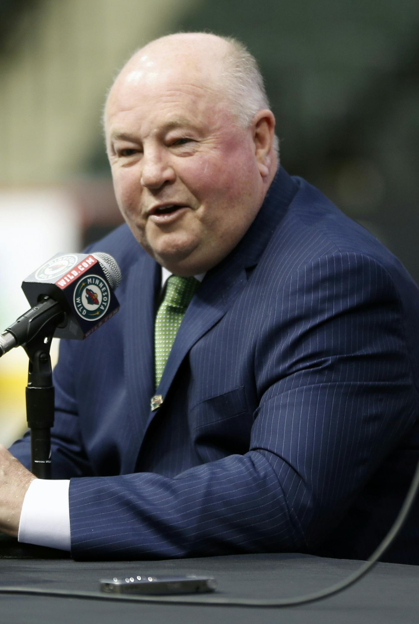 Bruce Boudreau is introduced as the new Minnesota Wild head coach during a news conference by the NHL hockey team Tuesday, May 10, 2016, in St. Paul, Minn. (AP Photo/Jim Mone)