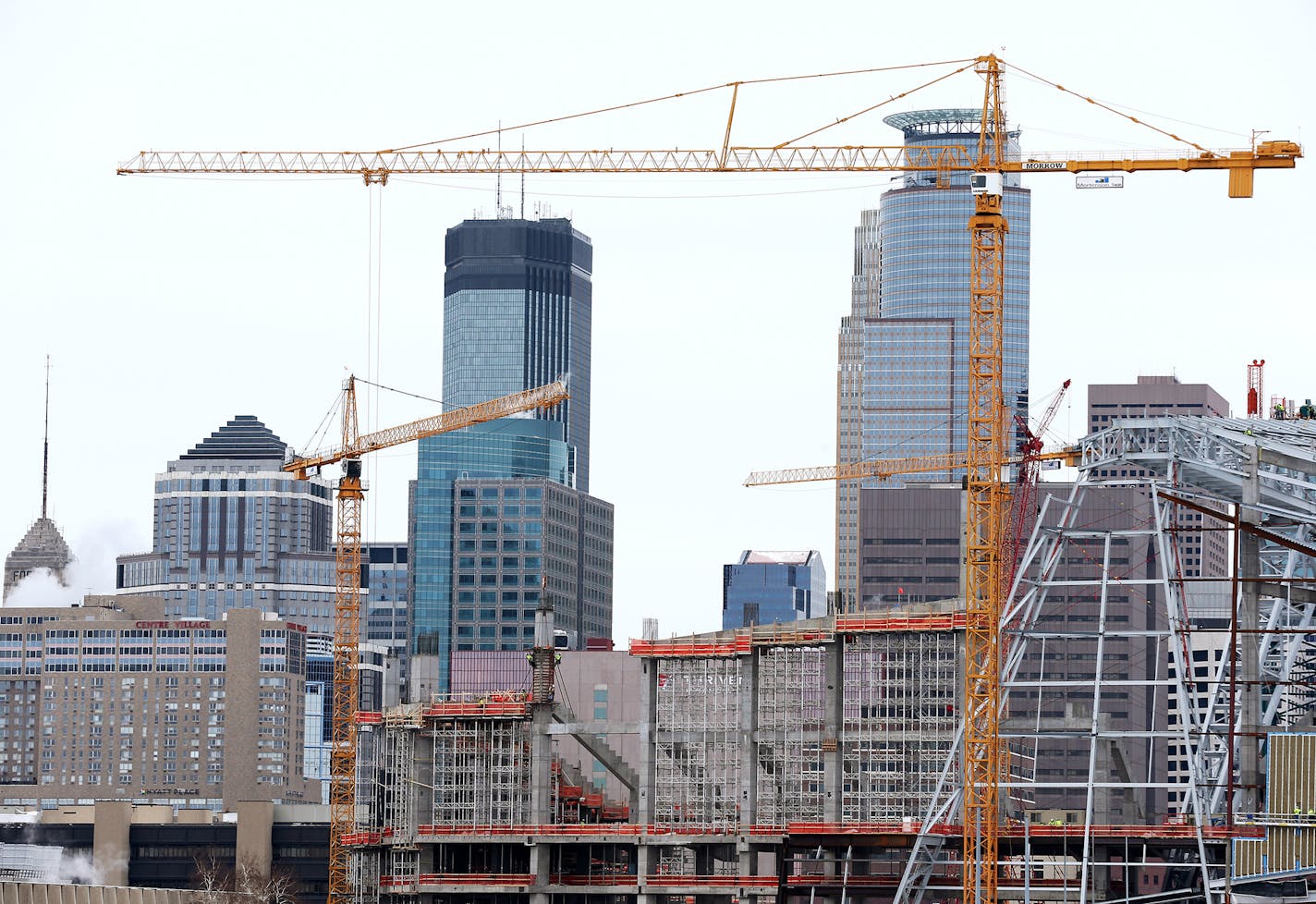 Construction of Vikings stadium in downtown Minneapolis is seen from the Cedar-Riverside neighborhood on Friday, January 2, 2015. ] LEILA NAVIDI leila.navidi@startribune.com /