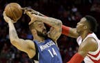Wolves center Nikola Pekovic tried to keep the ball from Houston&#x2019;s Dwight Howard on Jan. 13, when he shot 4-for-9 from the field. Pekovic hasn&