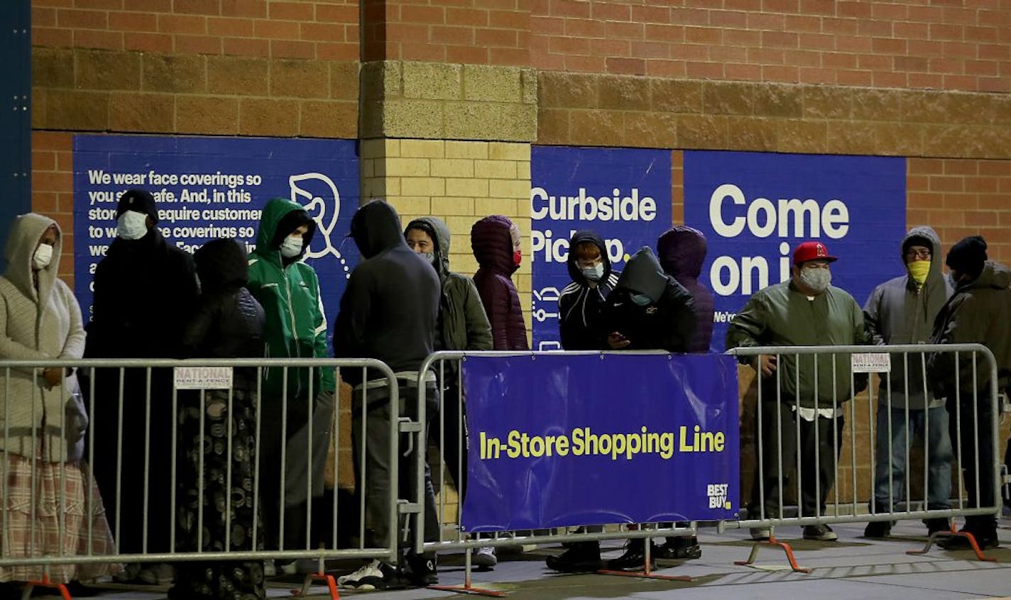 Black Friday shoppers line up outside Best Buy for their early 5 a.m. opening Friday in Richfield.