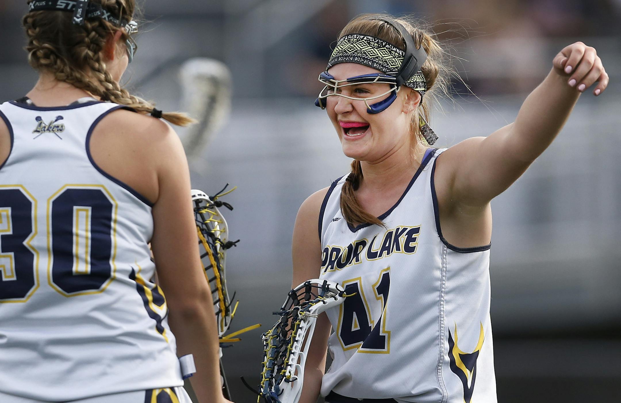 Sarah Pierson (41) celebrated with Mallory Schultze (30) after scoring her third goal if the of the first half. ] CARLOS GONZALEZ cgonzalez@startribune.com - May 23, 2016, Prior Lake, MN, Prior Lake High School / Prep girls' lacrosse. Prior Lake vs. Rosemount