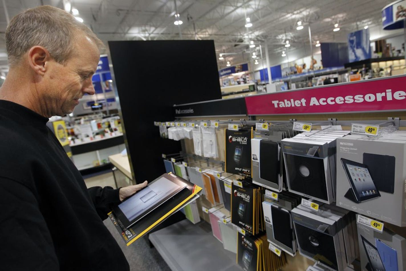 Greg Nelson went to a Best Buy store in Eagan to pick up a case for his iPad. Some online Christmas shoppers won't get their items.