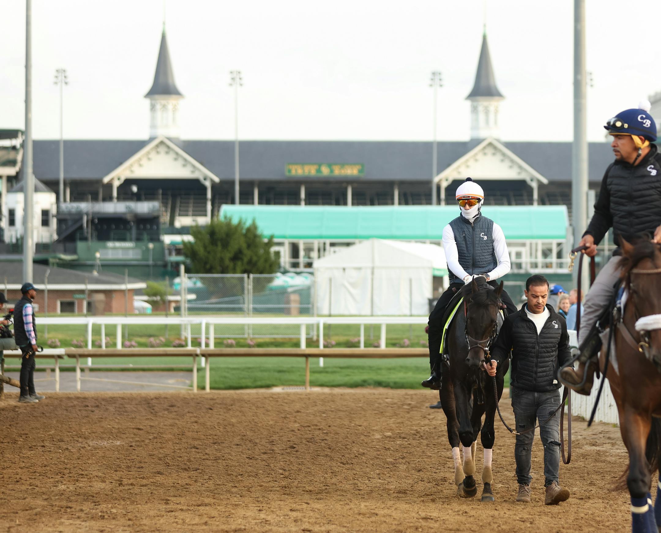 Zandon, with Kriss Bon up, comes off the track at Churchill Downs.