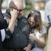 Pastor Frank Pomeroy and his wife Sherri near the First Baptist Church of Sutherland Springs, Texas Monday. The Pomeroy's daugher, Annabelle, 14, was 