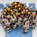 Minnesota huddles up around goalie Justen Close (1) before the start of the game Saturday, April 8, 2023, at Amalie Arena in Tampa, Fla. Minnesota Gol
