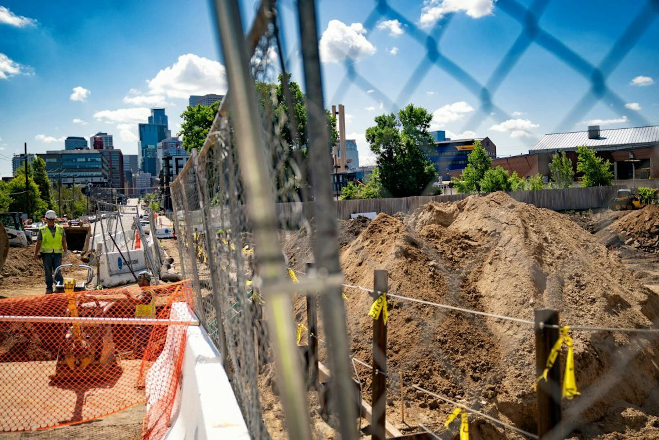 Workers were connecting utility lines at the site of Great River Landing in Minneapolis, a 48-unit apartment building for men who were incarcerated.