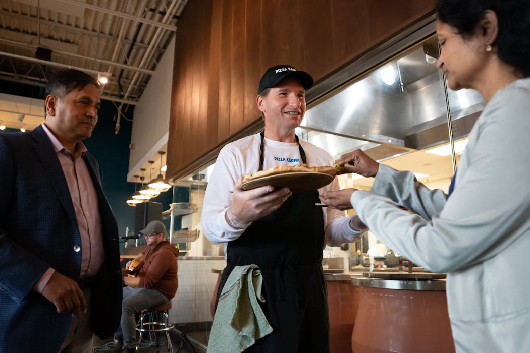 Democratic U.S. Rep. Dean Phillips went to Pizza Karma for an “on the job” event where he made pizzas along with the shop’s owners on Oct. 6 in Eden Prairie.