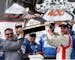 Dale Earnhardt Jr., right, held the winner's trophy with Pocono Raceway President Brandon Igdalsky after the NASCAR Sprint Cup Series Pocono 400 on Su