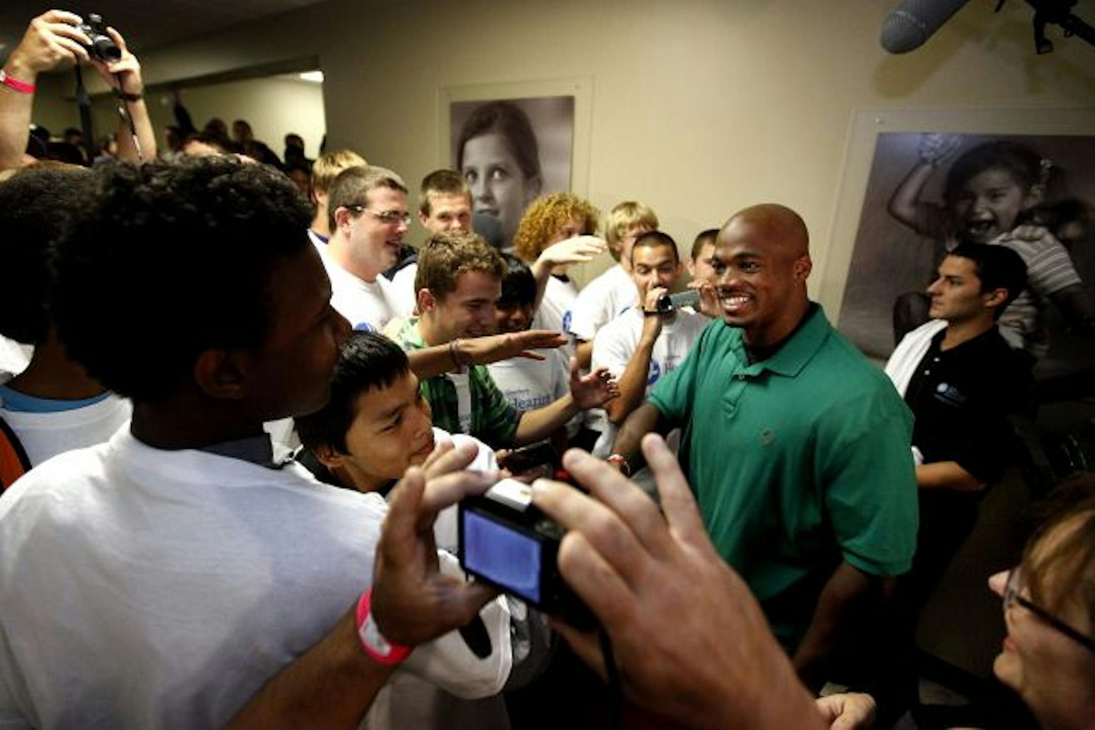 Minnesota Vikings running back Adrian Peterson greeted students, families and faculty from The Oregon School for the Deaf at Starkey Laboratories in Eden Prairie.