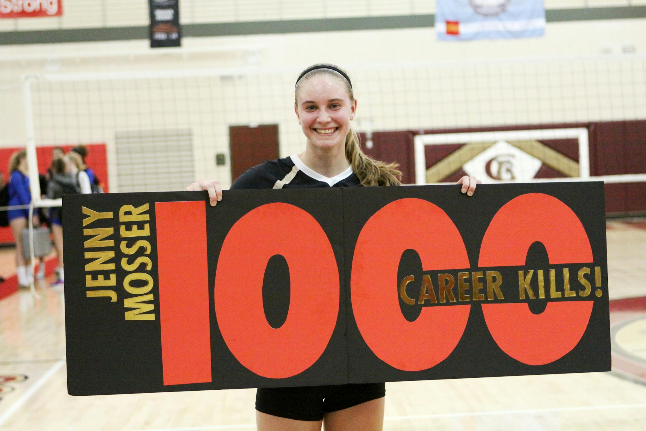 Lakeville South's Jenny Mosser after getting her 1,000th career kill.