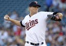 Minnesota Twins starting pitcher Kyle Gibson delivers to the New York Yankees during the first inning of a baseball game in Minneapolis, Thursday, Jun