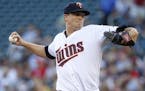 Minnesota Twins starting pitcher Kyle Gibson delivers to the New York Yankees during the first inning of a baseball game in Minneapolis, Thursday, Jun