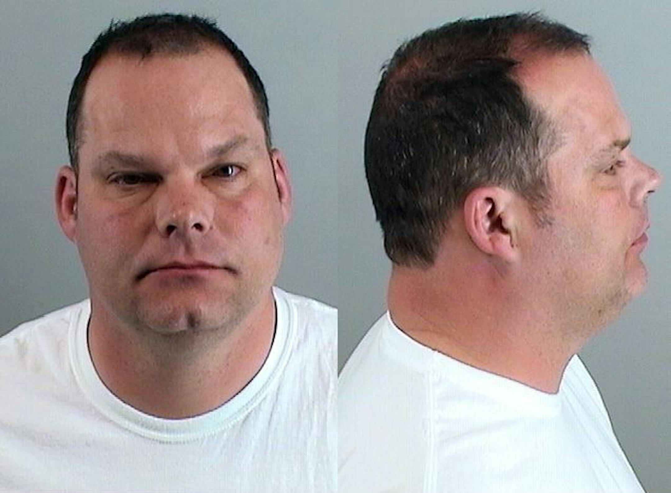 In a photo provided by the Douglas County (Colo.) Sheriff's Department, Tom Heckert, the Denver Broncos' new director of pro personnel, appears in a photo after he was arrested on June 11, 2013, and charged with driving under the influence and careless driving. The Broncos have suspended two executives who are facing drunken driving charges. Director of player personnel Matt Russell was suspended indefinitely without pay Monday, July 15, 2013, and Heckert was suspended for a month without pay.