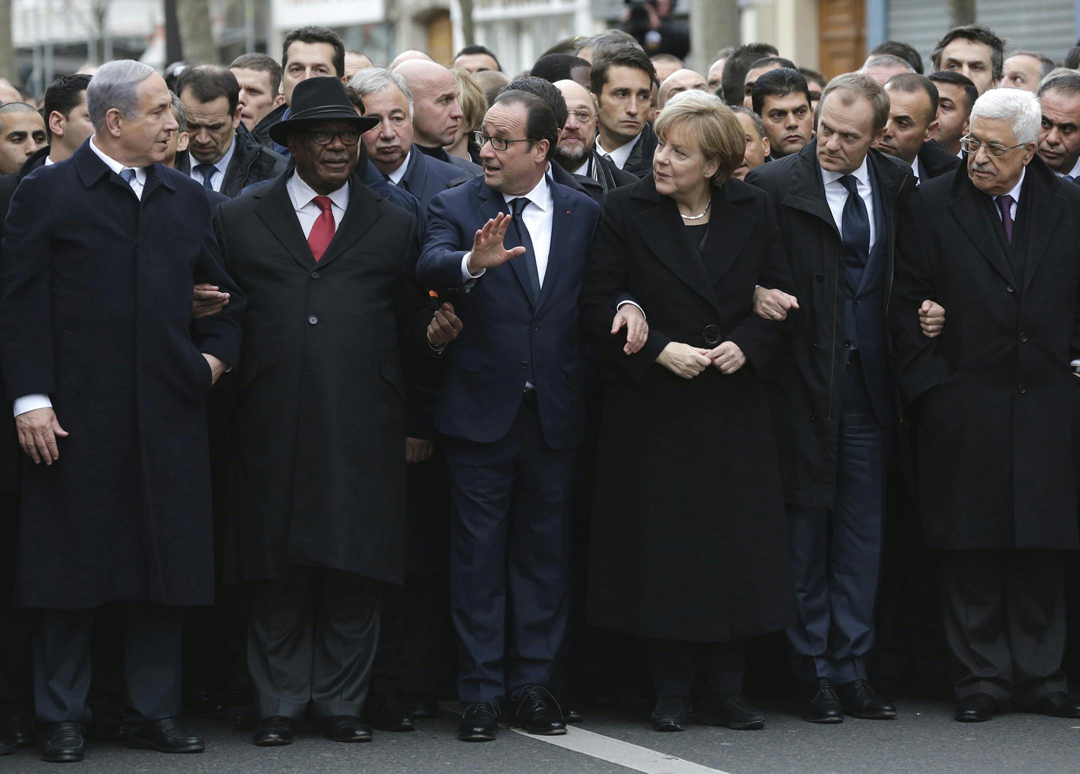 From the left : Israel's Prime Minister Benjamin Netanyahu, Mali's President Ibrahim Boubacar Keita, France's President Francois Hollande, Germany's Chancellor Angela Merkel, EU President Donald Tusk and Palestinian President Mahmoud Abbas, march during a rally in Paris, France, Sunday, Jan. 11, 2015. A rally of defiance and sorrow, protected by an unparalleled level of security, on Sunday will honor the 17 victims of three days of bloodshed in Paris that left France on alert for more violence.