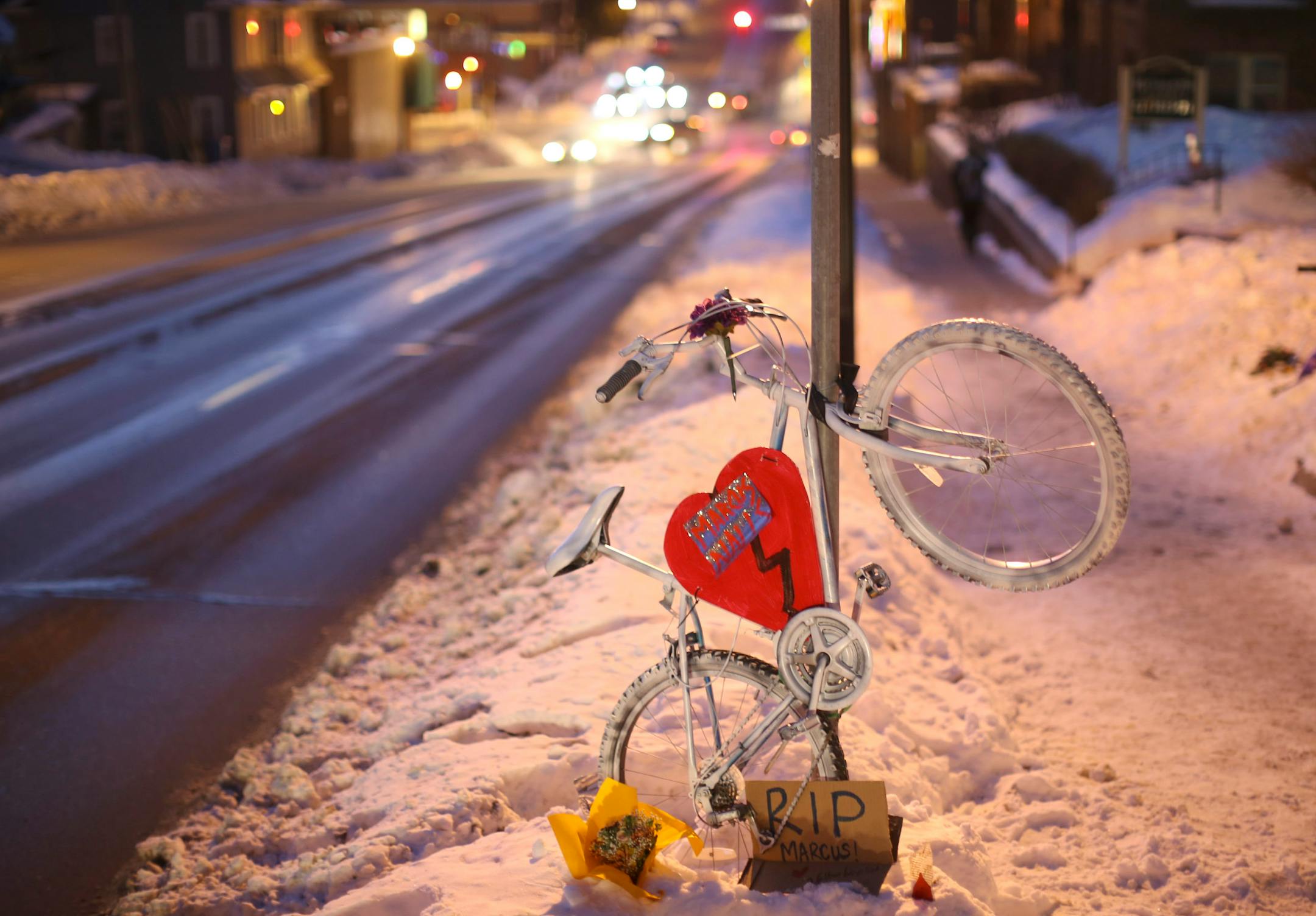 The ghost bike tribute to Marcus Nalls, 26, at the spot on W. Franklin Ave. where he was struck and killed by a van on Monday night while riding his bicycle. This photo was made Thursday evening, February 6, 2014.