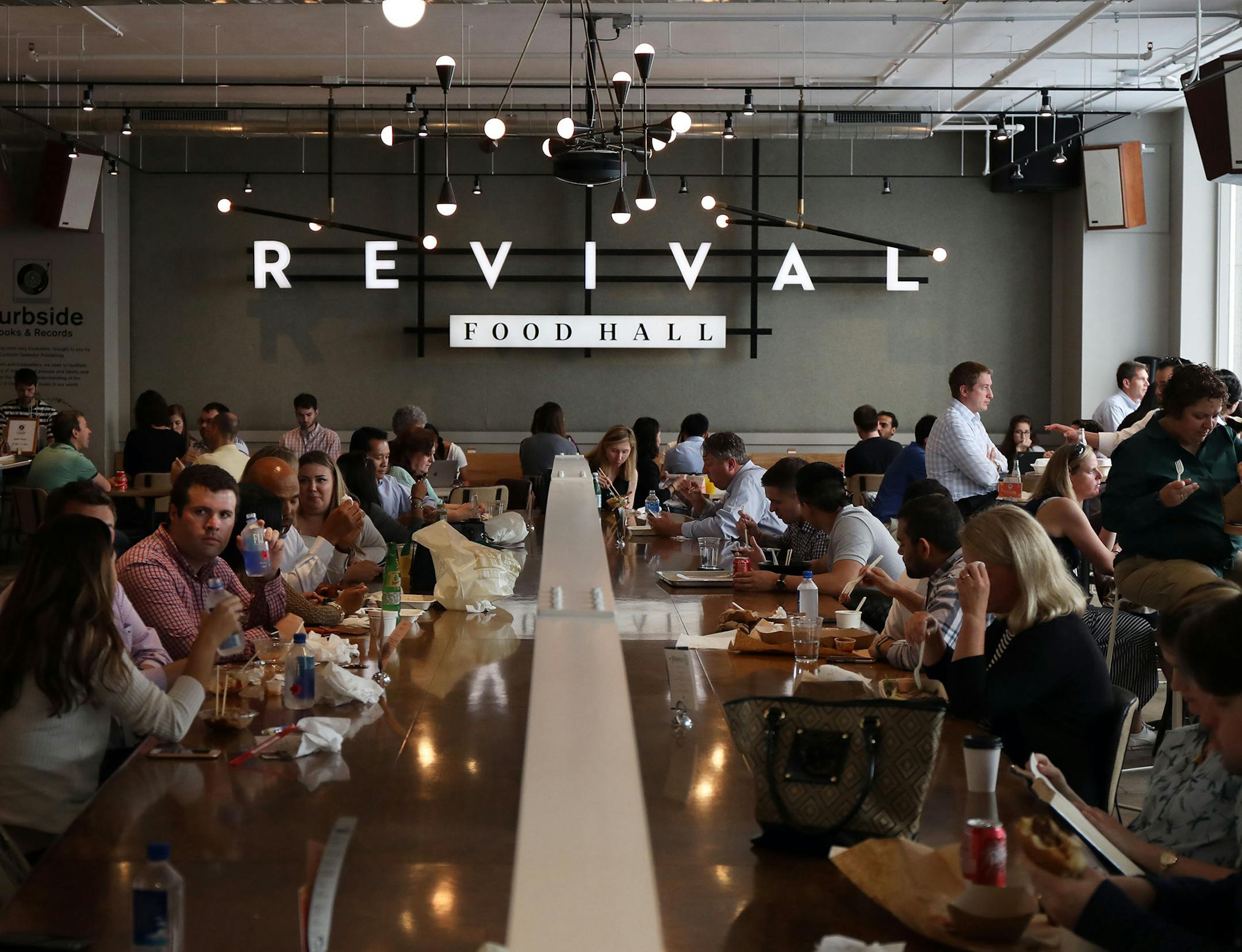 The Revival Food Hall, seen June 15, 2017, bustles with Loop diners. The food hall, which debuted in August, is open 7 a.m. to 7 p.m. weekdays and features independent stalls selling a variety of food, including gelato and tacos. (Phil Velasquez/Chicago Tribune/TNS)