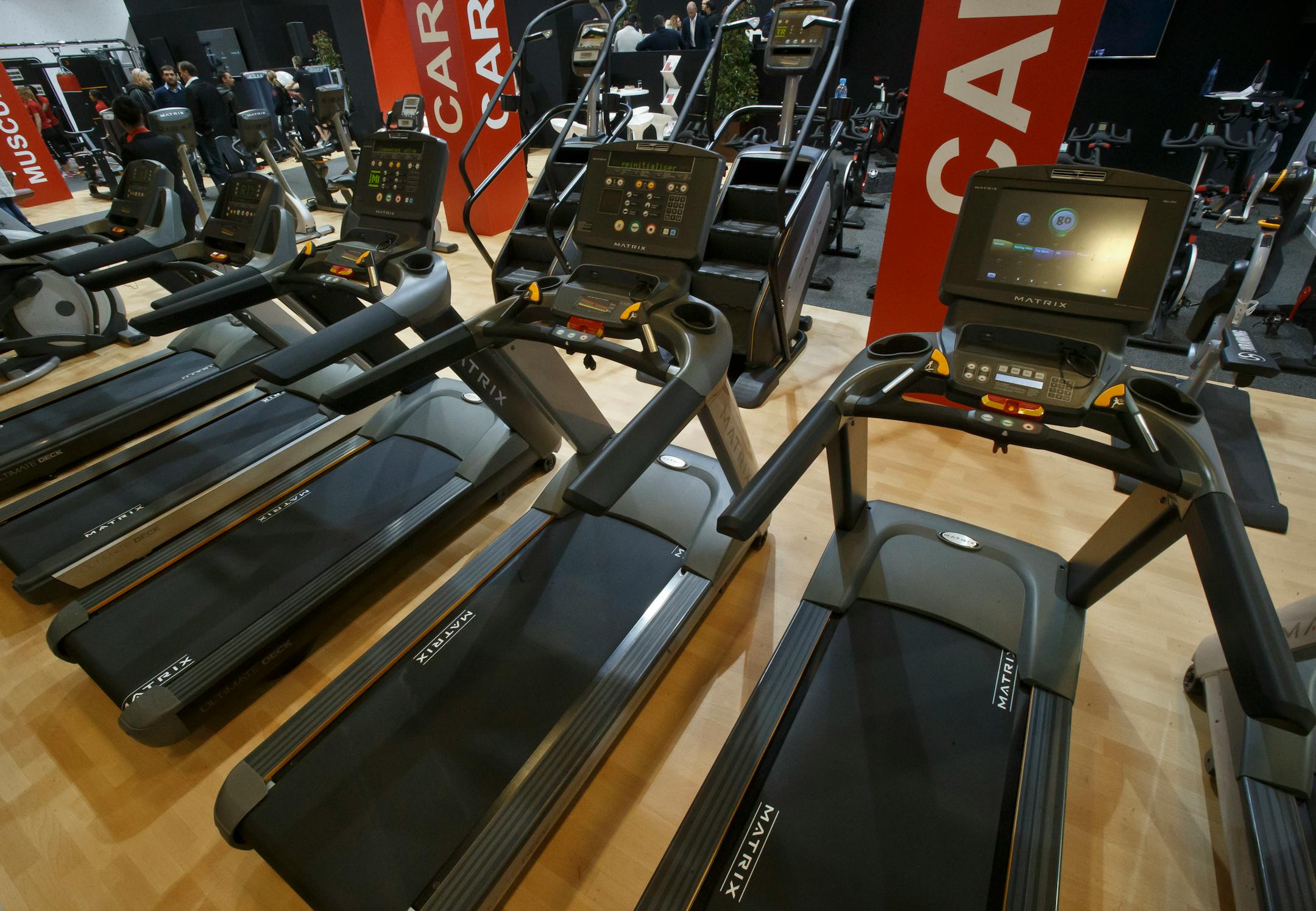 Motorized Treadmills line up at the Body Fitness fair in Paris, Friday, March 18, 2016. (AP Photo/Michel Euler)