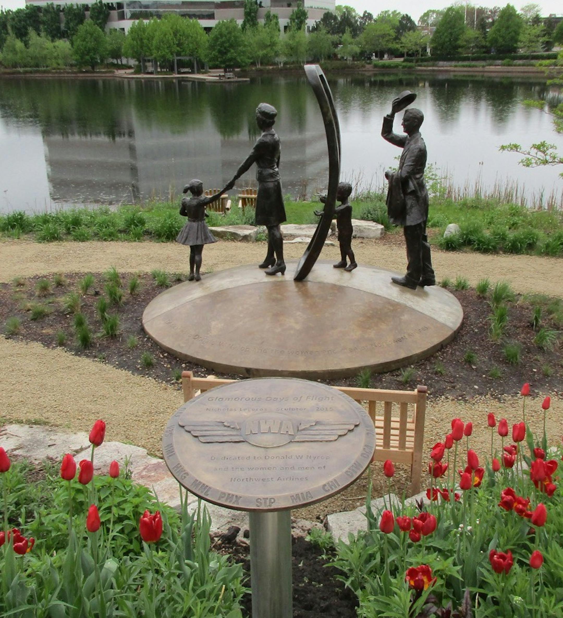 "Glamorous Days of Flight," a family boarding a Northwest flight, is one of the sculptures dedicated to the men and women of the former Northwest Airlines at Centennial Lakes Park in Edina.